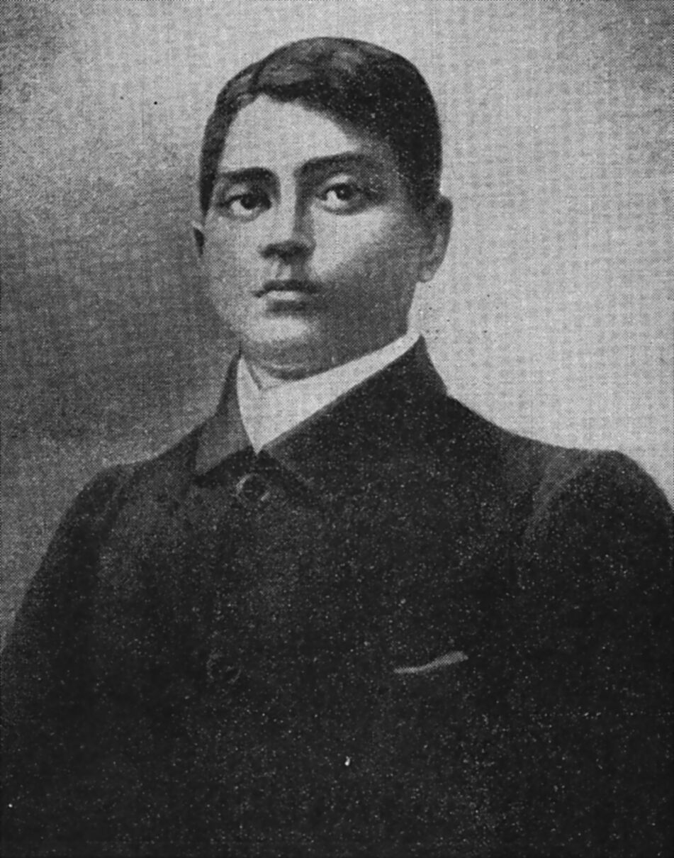 Formal portrait of Jatindranath Mukherjee in a dark coat with a white collar, reproduced from a printed halftone.